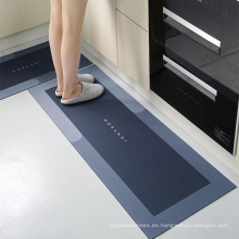 Mujas de goma de la alfombra absorbente de agua de la cocina